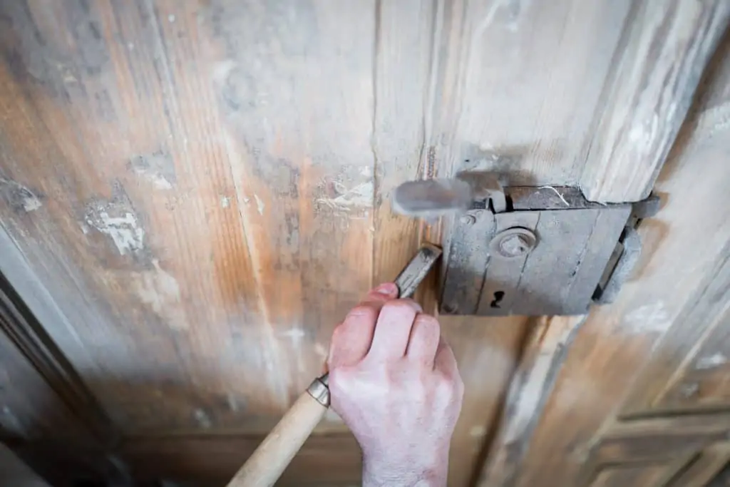 Refinishing a door.