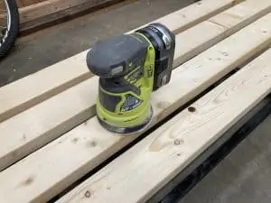 What is a random orbital sander used for?